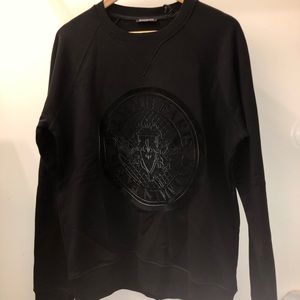 Black Balmain sweater with Balmain Coin.